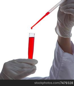 Female scientist researcher conducting an experiment in a laboratory. Female scientist researcher conducting an experiment in a labora