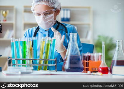 Female scientist researcher doing experiments in laboratory