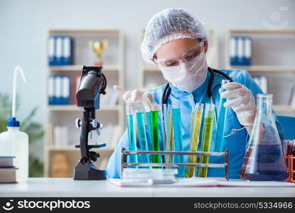 Female scientist researcher doing experiments in laboratory