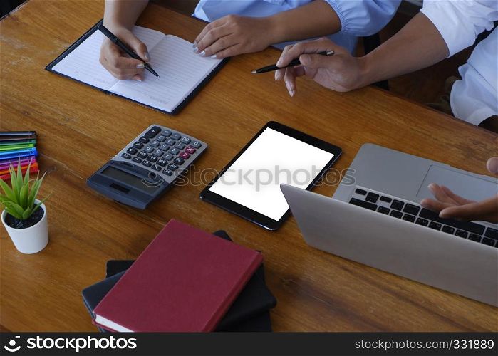 female secretary sitting next to boss taking down note in office Concept of business routine - Image