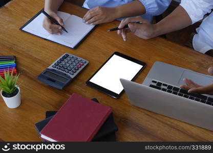 female secretary sitting next to boss taking down note in office Concept of business routine - Image