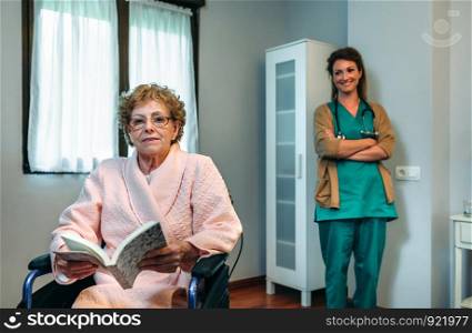 Female senior patient posing with female doctor in the background. Senior patient posing with doctor in the background