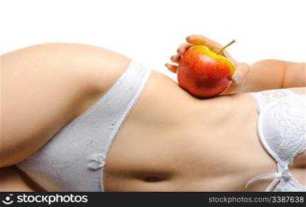 Female shapely a body and a red apple. It is isolated on a white background