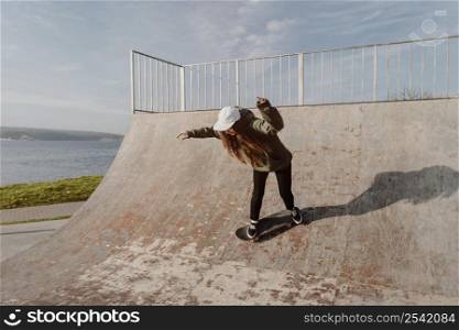 female skateboarder using ramps tricks