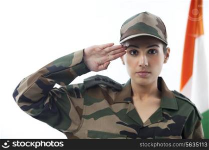 Female soldier saluting with Indian flag in background