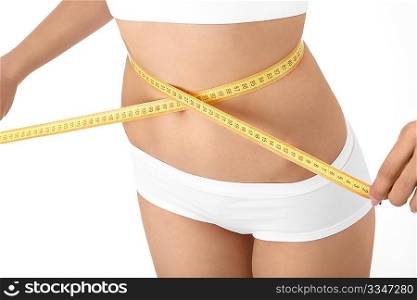 Female stomach with the measuring band, isolated