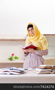 Female student in hijab preparing for exams 