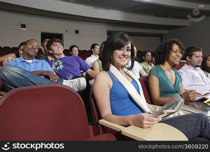 Female student sitting in class, portrait
