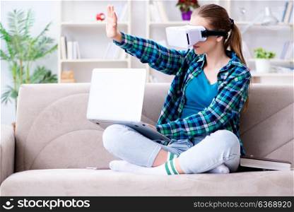 Female student sitting on the sofa with virtual glasses