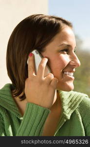 Female student talking on her cellular telephone