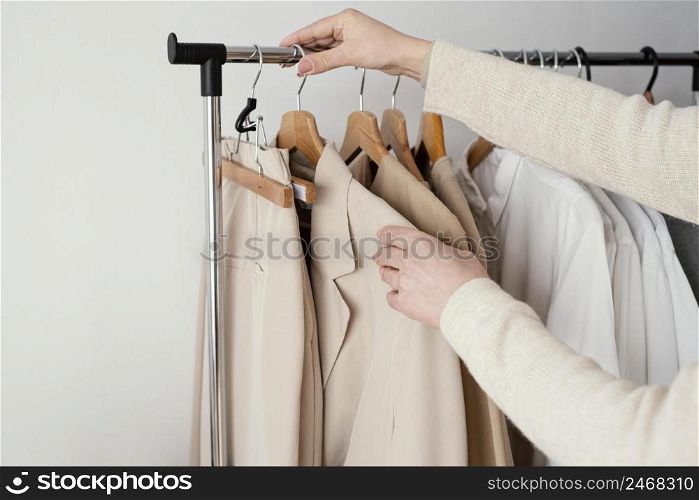 female tailor checking garments
