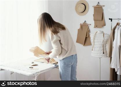 female tailor studio with clothes