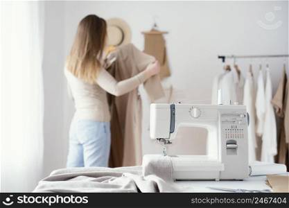 female tailor working studio