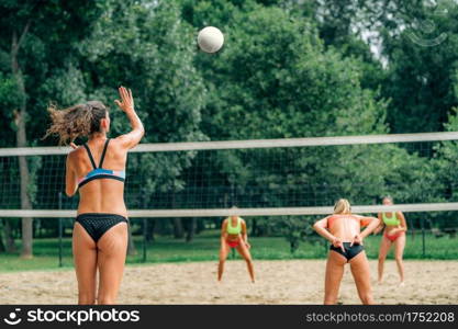 Female Team Playing Beach Volleyball