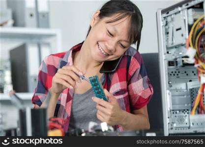 female technician on the phone