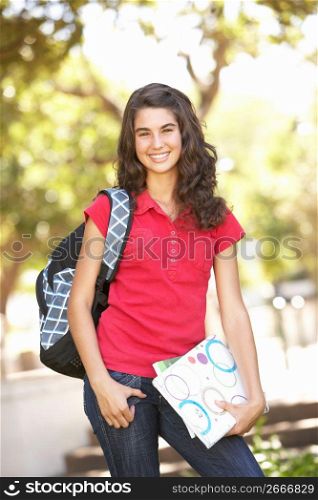 Female Teenage Student In Park
