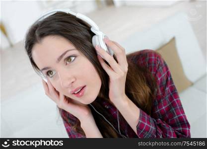 female teenager listening to the music