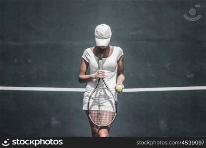Female tennis player. Female tennis player on court ready to play