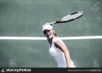 Female tennis player. Female tennis player on court waiting for ball