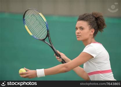 female tennis player on the court