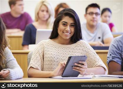 Female University Student Using Digital Tablet In Lecture