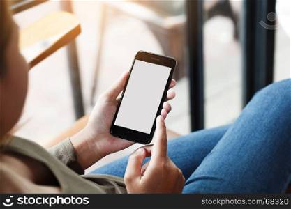 female using phone show white screen display in coffee shop outdoor lifestyle