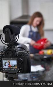 Female Vlogger Making Social Media Video About Cooking For The Internet                               