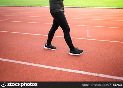 female woman exercise running at sport stadium