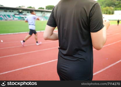 female woman exercise running at sport stadium