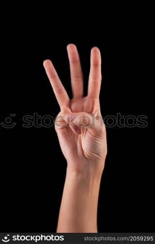 Female woman hand on the dark background. woman hand