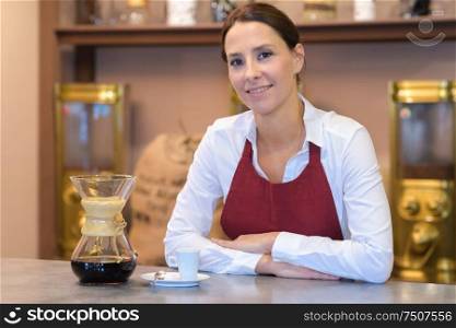 female worker at a coffee at coffee factory