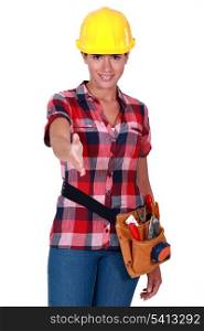 Female worker holding out hand