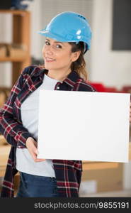 female worker showing an empty banner