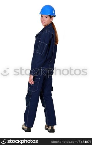 Female worker wearing overalls