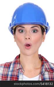 Female worker with look of surprise on face