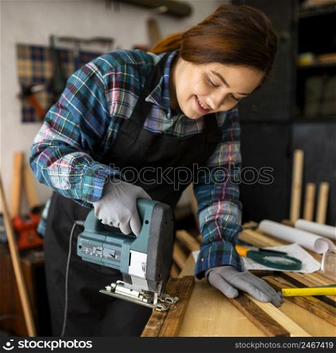 female working workshop with hammer drill 3