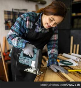 female working workshop with hammer drill 3