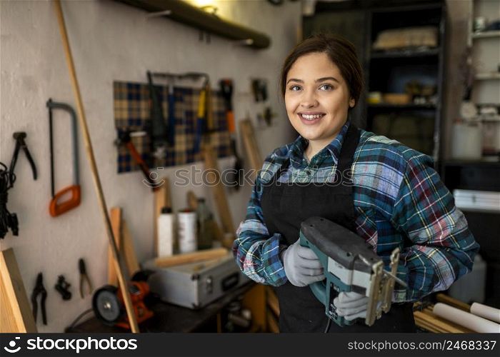 female workshop with tools dor repairing