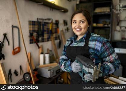 female workshop with tools dor repairing