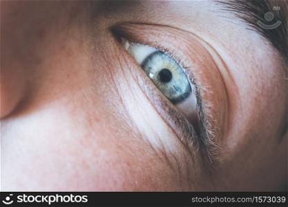 Feminine eyes, with blue iris, cut out of the face, healthcare