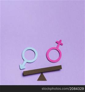 feminine masculine gender signs seesaw