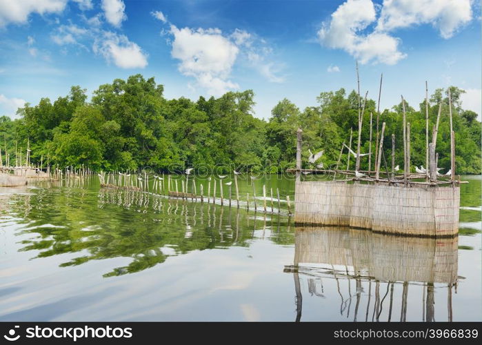 fence for fishing in the lake