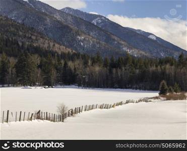 Fence in snow covered field, Highway 16, Yellowhead Highway, British Columbia, Canada