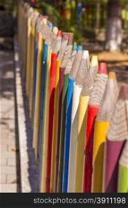 Fence of colourful pencils outside a preschool. Nice depth of field.