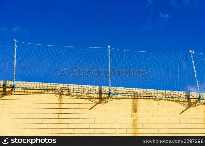 Fencing installed on roof of a house. Security mesh. Fencing installed on roof of a house.