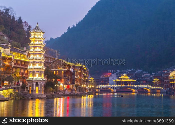 Fenghuang (Phoenix) ancient town sunset duak, Hunan province, China