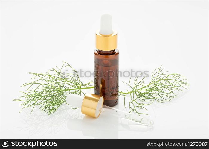 Fennel essential oil isolated on white background. Foeniculum vulgare
