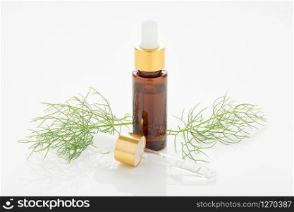 Fennel essential oil isolated on white background. Foeniculum vulgare