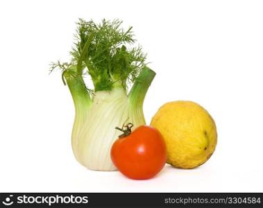 Fennel, tomato and lemon on white background