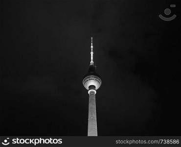 Fernsehturm (meaning Television tower) in Alexanderplatz in Berlin, Germany in black and white. Fernsehturm (TV Tower) in Berlin in black and white